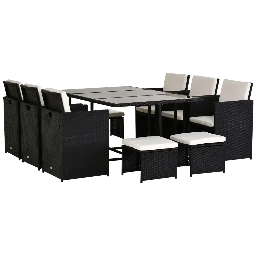 Conjunto de jardín con cojines de ratán negro y mesa de cristal