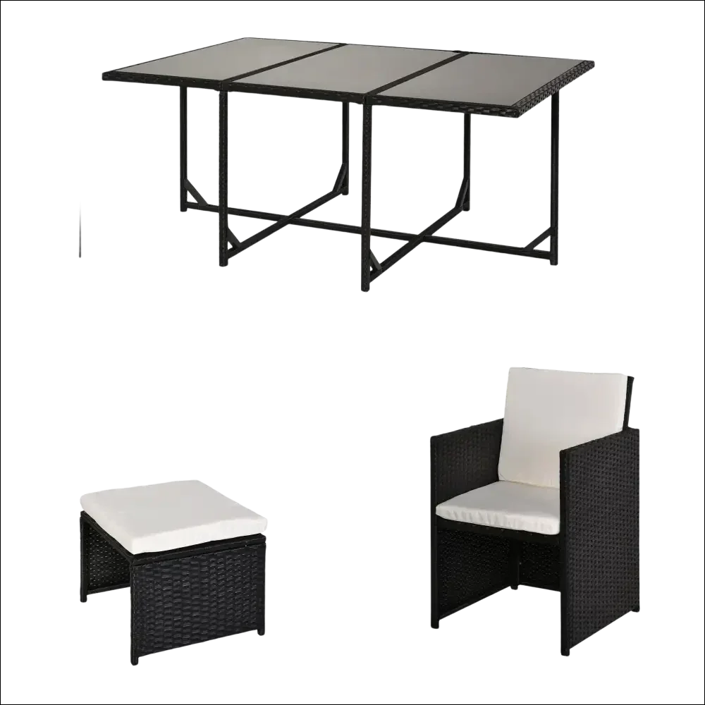 Conjunto de jardín con cojines de ratán negro y mesa de cristal