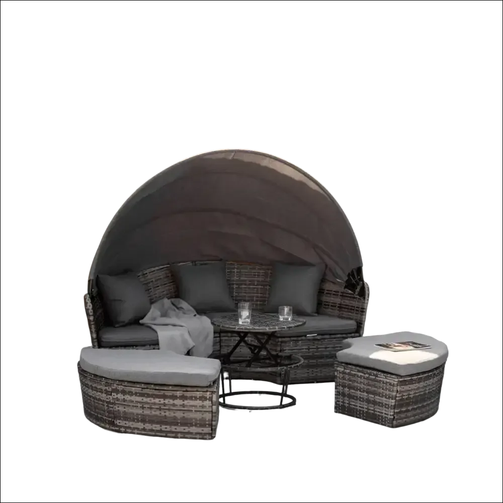 Cama de día redonda de mimbre gris con dosel curvo y cojines a juego