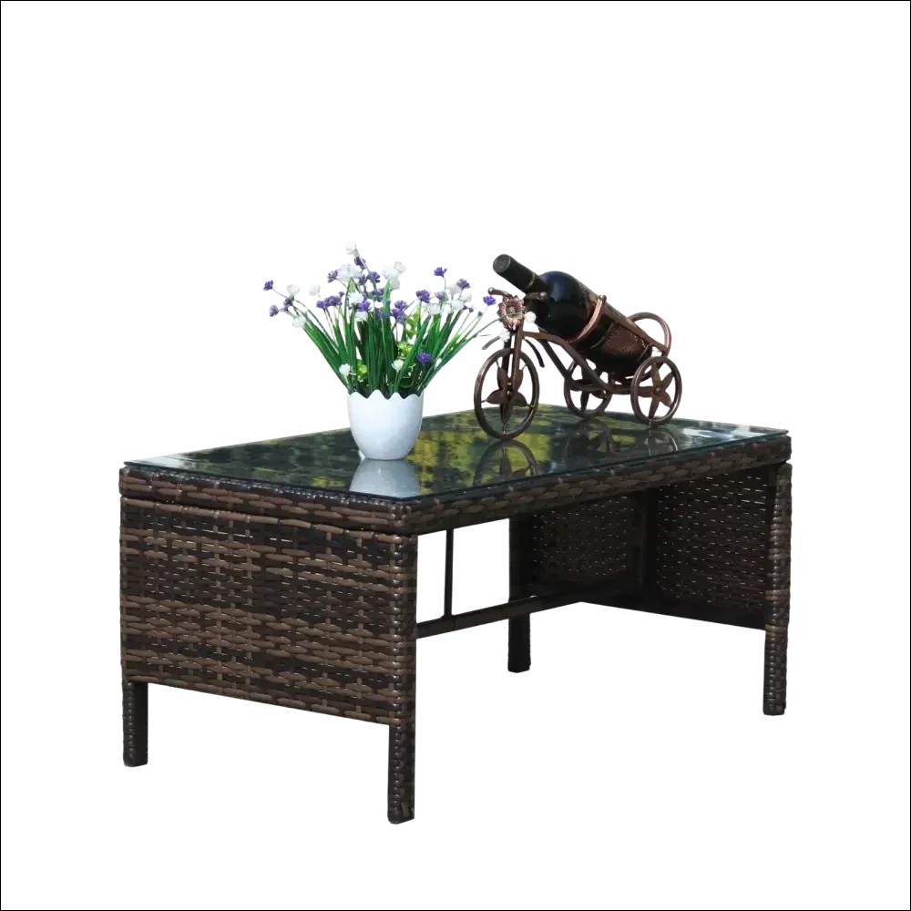 Mesa de café con cristal templado claro de mimbre marrón