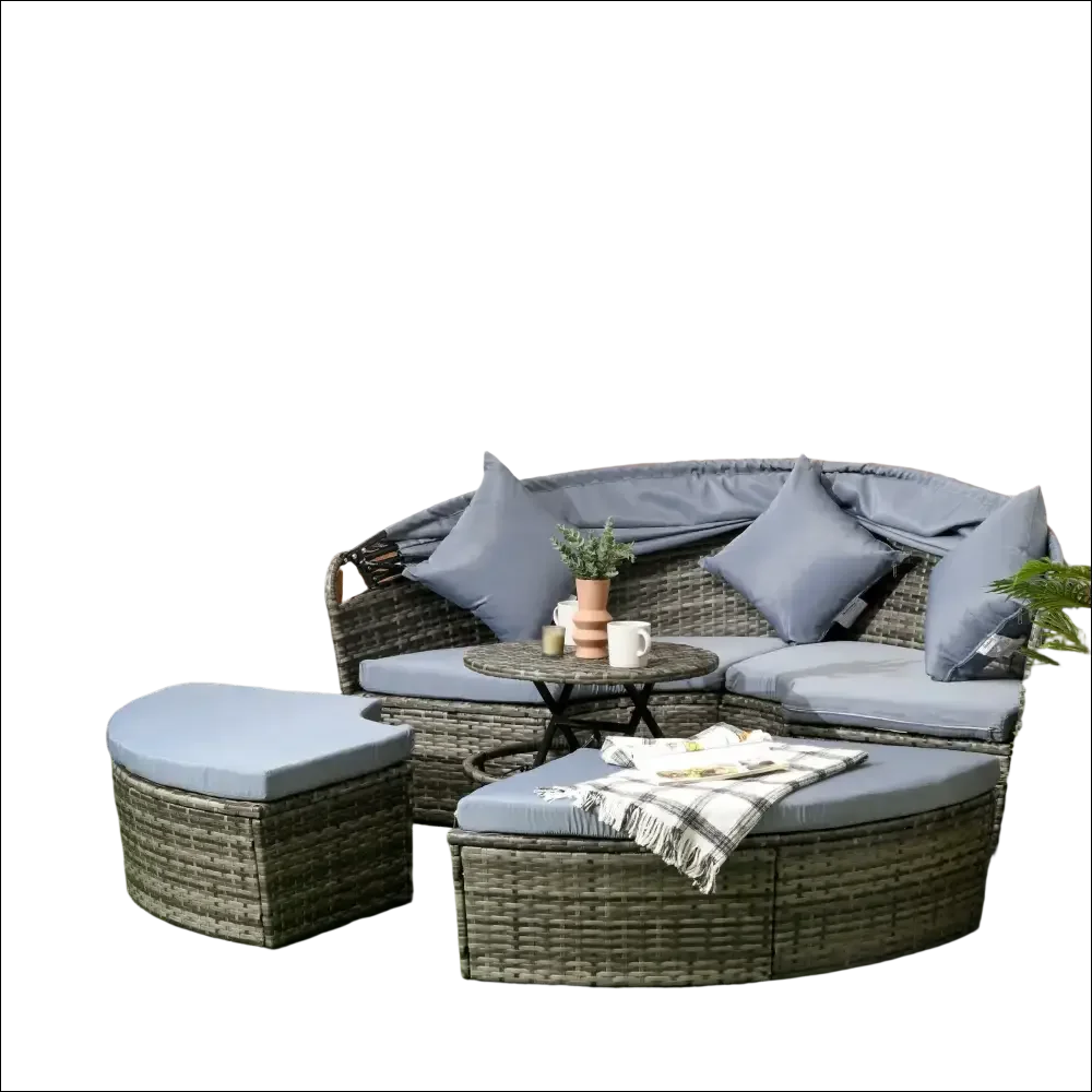 Set de muebles de ratán gris con mesa de té y cojines azules