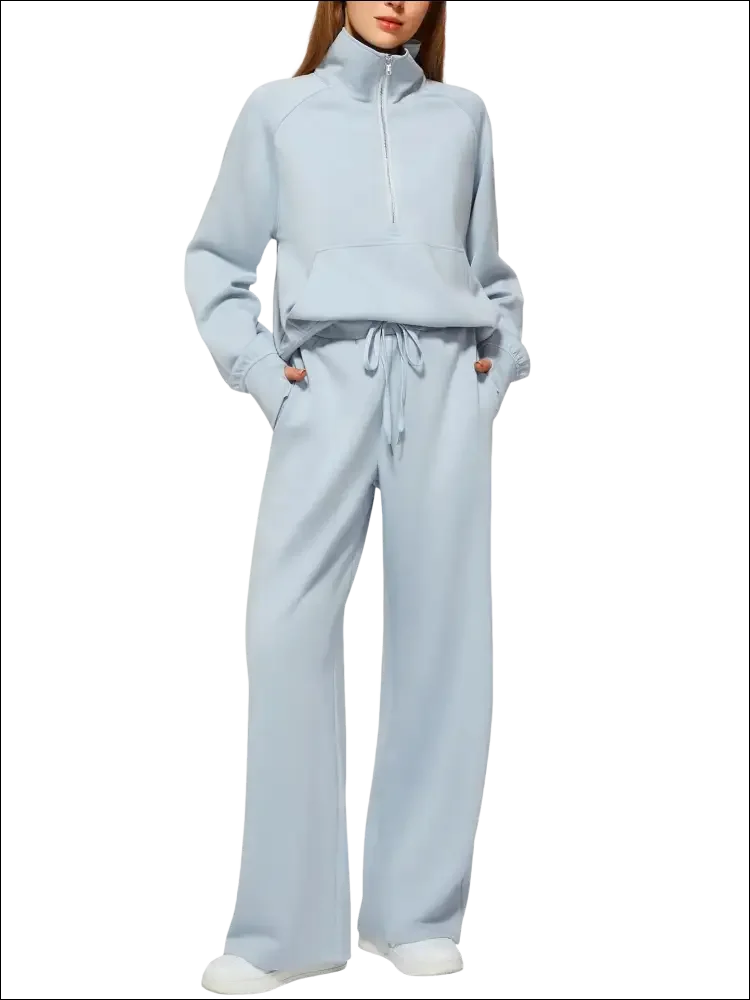 Sudadera de manga larga con cremallera azul claro y pantalones anchos para mujer